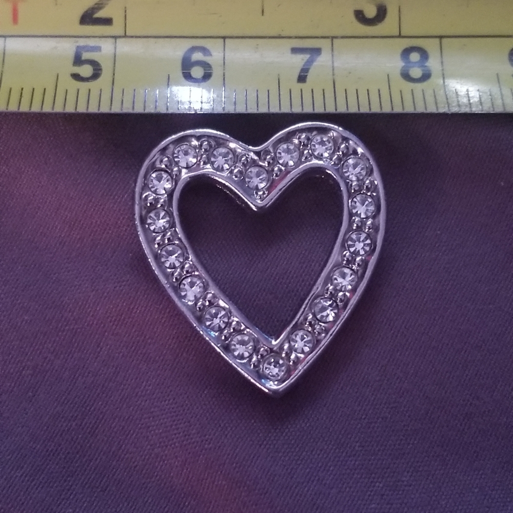 Vintage silver toned Avon rhinestone heart pin